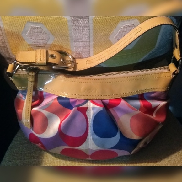 Coach Handbags - Coach multi color purse on hold on vacation